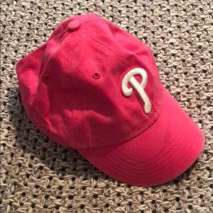Baby pink Phillies cap.